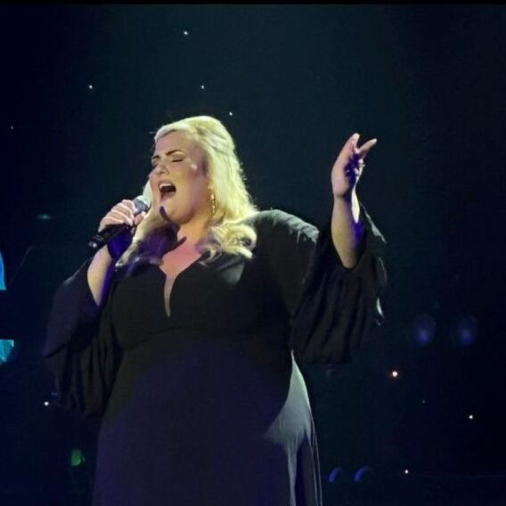 Abbie Edvards performing Adele